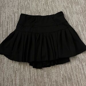 Black goldhinge mini skirt